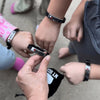 Matching HERO & Heart deployment bracelets for parent and child, symbolizing connection during military separation.